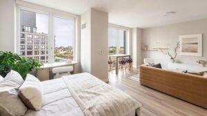 NO FEE! Large Alcove Studio with W/D in unit in Luxury Building!