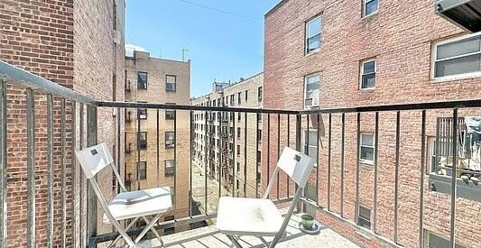 Sleek 2BR w/ Balcony &amp; Amenities Galore in the Heart of PLG! No Fee!