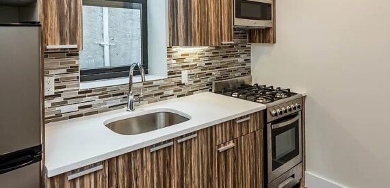 Renovated 2BR Bed-Stuy Gem: Exposed Brick, Backyard, Laundry, Prime Location!