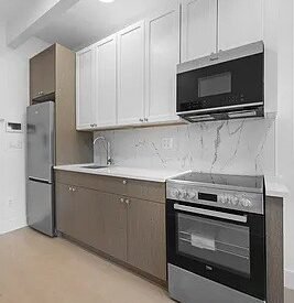 Modern 2BR w/ Rooftop, Elevator, Laundry &amp; Parking in Wingate – No Fee!