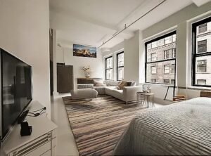 Elegant Midtown West Loft – Doorman, Laundry, Natural Light, Prime Location