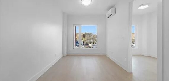 Modern 2BR w/ Rooftop, Elevator, Laundry &amp; Parking in Wingate – No Fee!