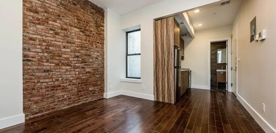 Renovated 2BR Bed-Stuy Gem: Exposed Brick, Backyard, Laundry, Prime Location!