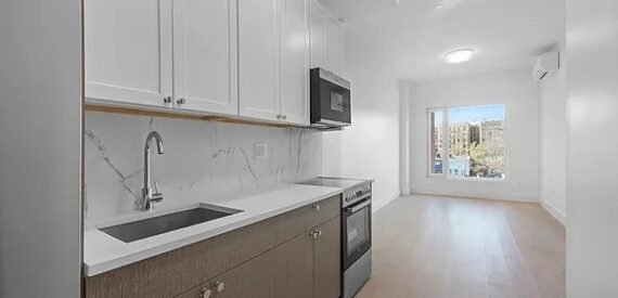 Modern 2BR w/ Rooftop, Elevator, Laundry &amp; Parking in Wingate – No Fee!