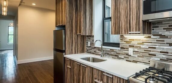 Renovated 2BR Bed-Stuy Gem: Exposed Brick, Backyard, Laundry, Prime Location!