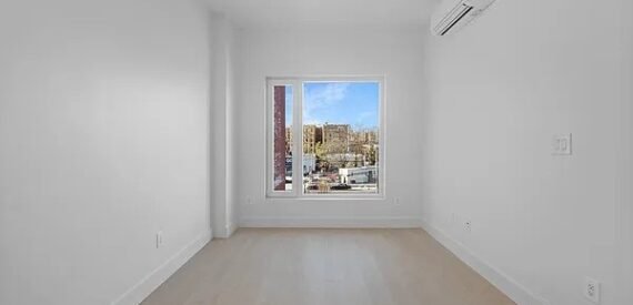 Modern 2BR w/ Rooftop, Elevator, Laundry &amp; Parking in Wingate – No Fee!
