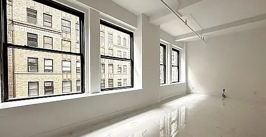 Elegant Midtown West Loft – Doorman, Laundry, Natural Light, Prime Location