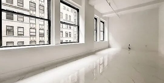 Elegant Midtown West Loft – Doorman, Laundry, Natural Light, Prime Location