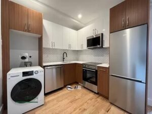 Modern 2BR w/ Private Balcony, In-Unit Laundry &amp; Roof Deck in Bed-Stuy
