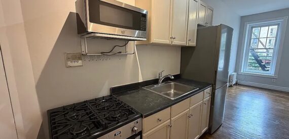 Renovated 1BR West Village Apt w/ Washer-Dryer, Fireplace &amp; Exposed Brick